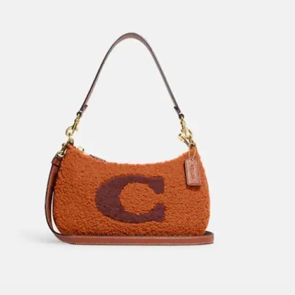 NWT Coach GENUINE SHEARLING teri shoulder bag with coach motif NEW WITH TAG​…